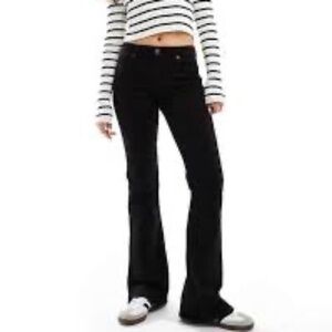 Bershka high waisted flared jeans in black Size 4 Like New